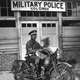 A uniformed African American police officer in Columbus, Georgia.
